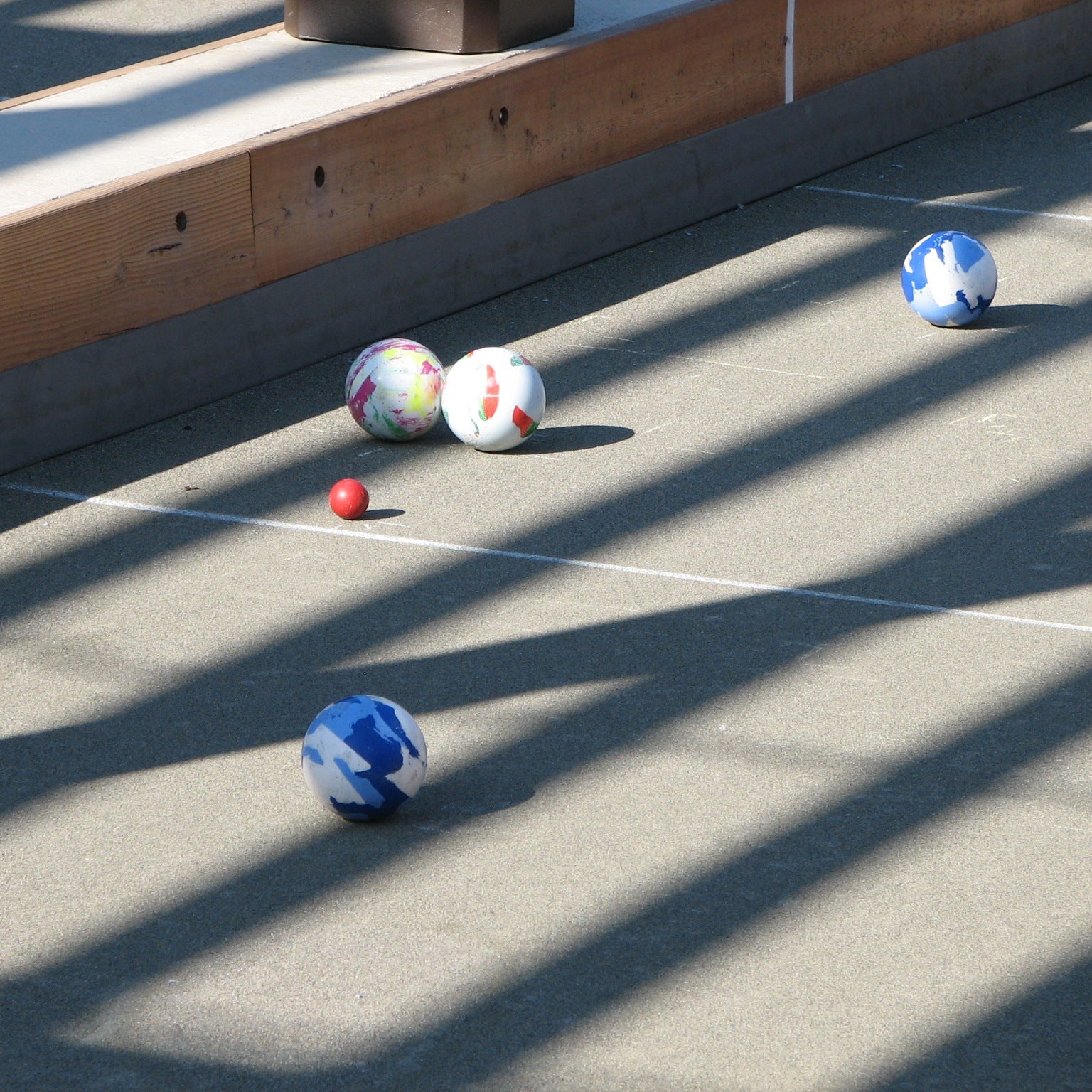 Resin bocce court with colorful bocce balls